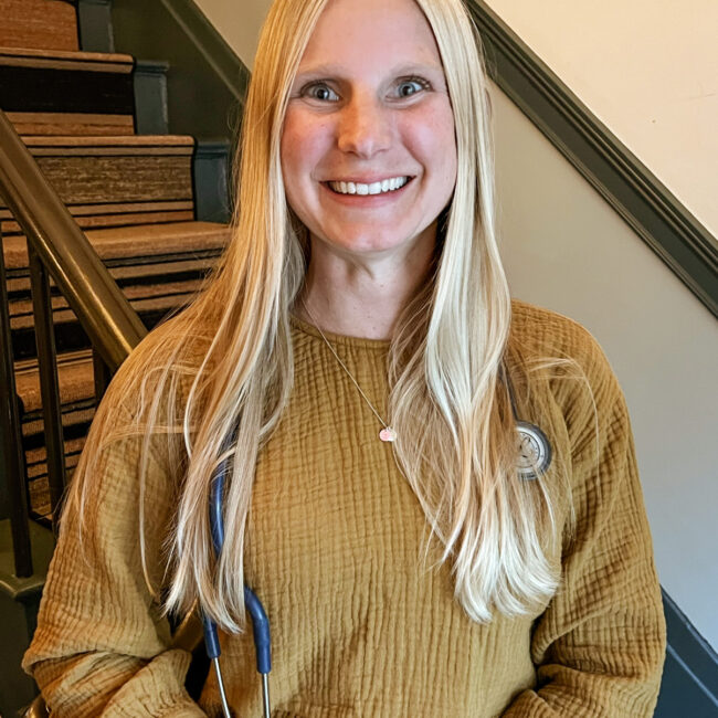 Functional Medicine Provider Alison Percowycz, MSN, FNP-C with a stethoscope in Denver Colorado